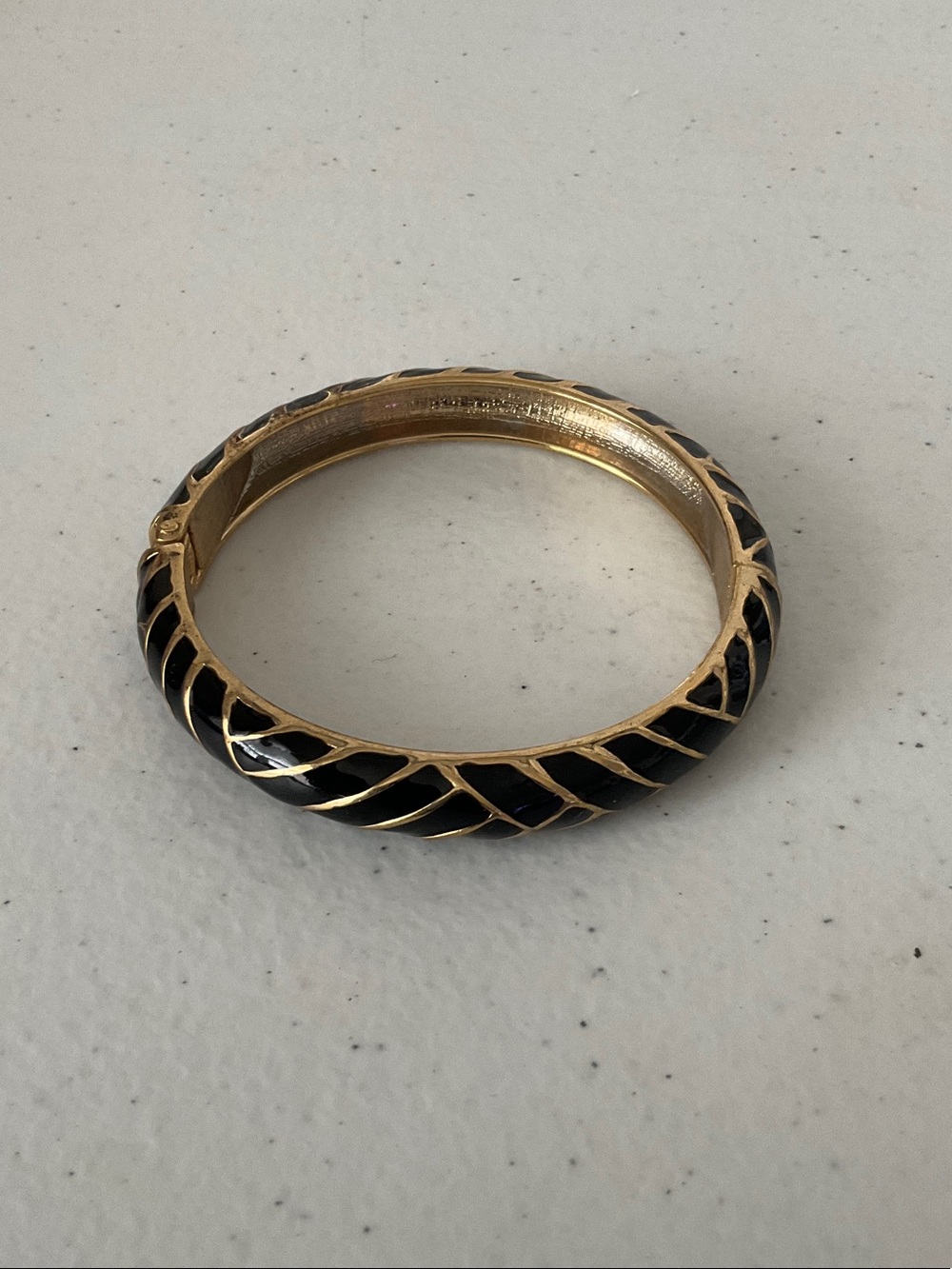 Gold-Tone Bangle Bracelet with Black Enamel Accent